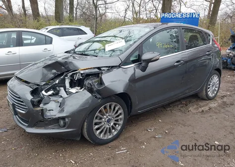 2016 Ford Fiesta Titanium z USA, uszkodzony, nr VIN 3FADP4FJXGM130417